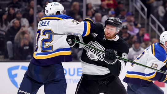 Los Angeles Kings defenseman Vladislav Gavrikov (84) pushes St. Louis Blues defenseman Justin Faulk (72) during a physical battle in the second period at Crypto.com Arena in Los Angeles on March 8, 2025. Los Angeles Kings defenseman Vladislav Gavrikov (84) pushes St. Louis Blues defenseman Justin Faulk (72) during a physical battle in the second period at Crypto.com Arena in Los Angeles on March 8, 2025.