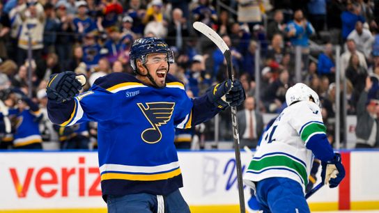 Mathieu Joseph (#71) of the St. Louis Blues reacts after teammate Zack Bolduc scores against the Vancouver Canucks during the second period at Enterprise Center in St. Louis, Missouri, on March 20, 2025.