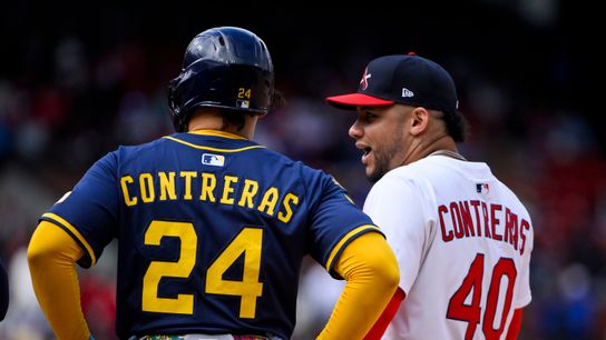 St. Louis Cardinals first baseman Willson Contreras (40) chats with Milwaukee Brewers catcher William Contreras (24) during the seventh inning at Busch Stadium.