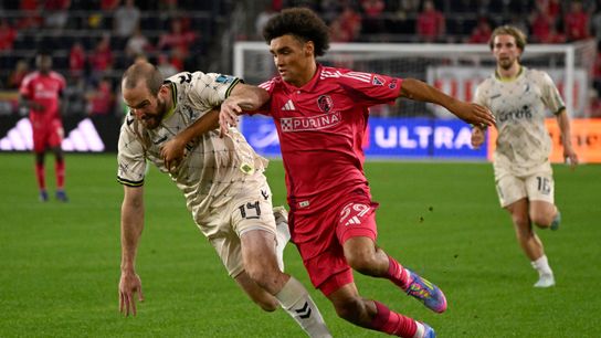 May 7, 2025; St. Louis, Missouri, USA; Union Omaha defender Brent Kallman (14) battles St. Louis City midfielder MyKhi Joyner (59) in the second half at Energizer Park