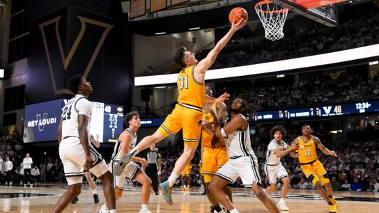 Missouri Tigers guard Caleb Grill (31) scores a layup against the Vanderbilt Commodores during the second half at Memorial Gymnasium in Nashville, Tennessee, on March 1, 2025.