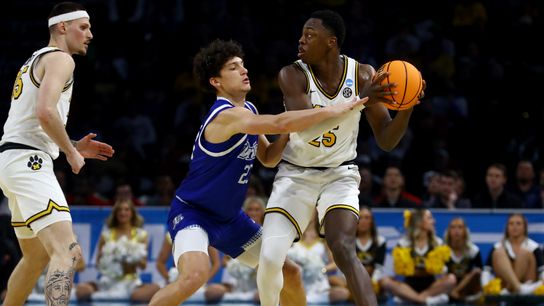 Drake Bulldogs guard Isaia Howard (23) defends Missouri Tigers guard Mark Mitchell (25) during the second half of the NCAA Tournament first-round game at Intrust Bank Arena in Wichita, Kansas, on March 20, 2025.