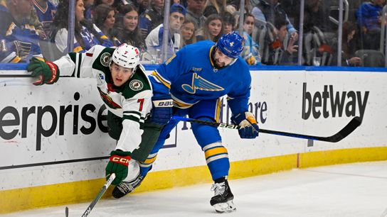 Mar 16, 2024; St. Louis, Missouri, USA; St. Louis Blues defenseman Nick Leddy (4) defends against Minnesota Wild defenseman Brock Faber (7) during the first period at Enterprise Center. Mar 16, 2024; St. Louis, Missouri, USA; St. Louis Blues defenseman Nick Leddy (4) defends against Minnesota Wild defenseman Brock Faber (7) during the first period at Enterprise Center.