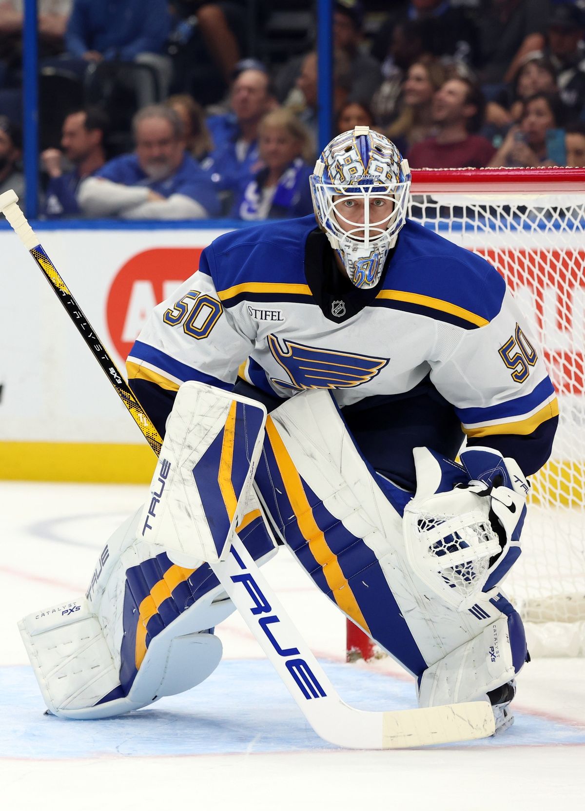 Dec 19, 2024; Tampa, Florida, USA;St. Louis Blues goaltender Jordan Binnington (50) looks down ice against the Tampa Bay Lightning during the first period at Amalie Arena. 